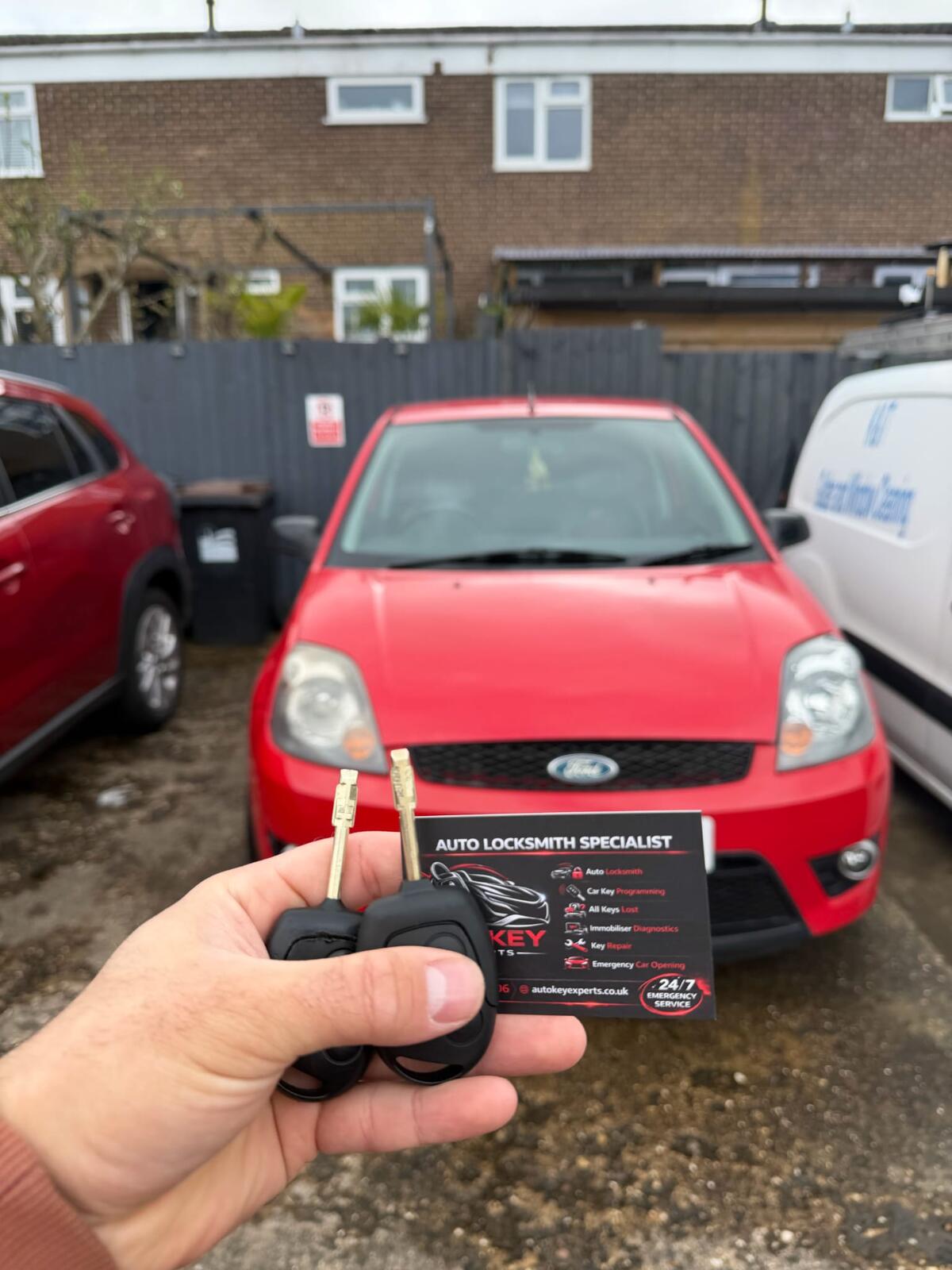 Autel key programmer in use inside a Vauxhall Corsa