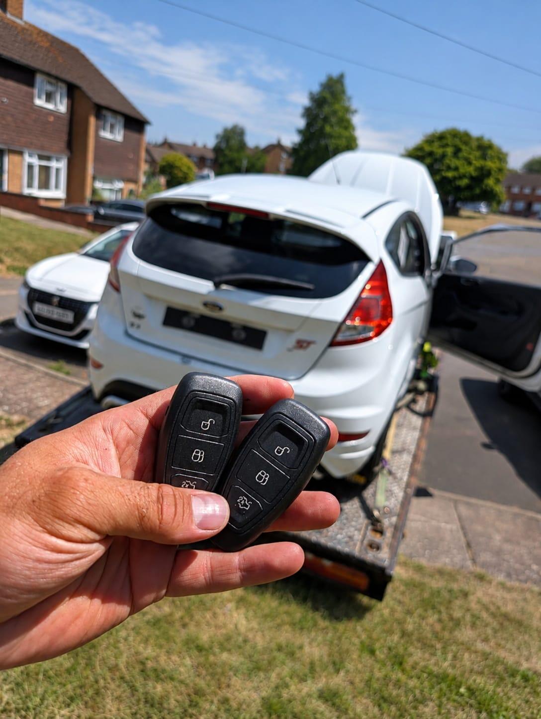 Key programming equipment connected to vehicle OBD port
