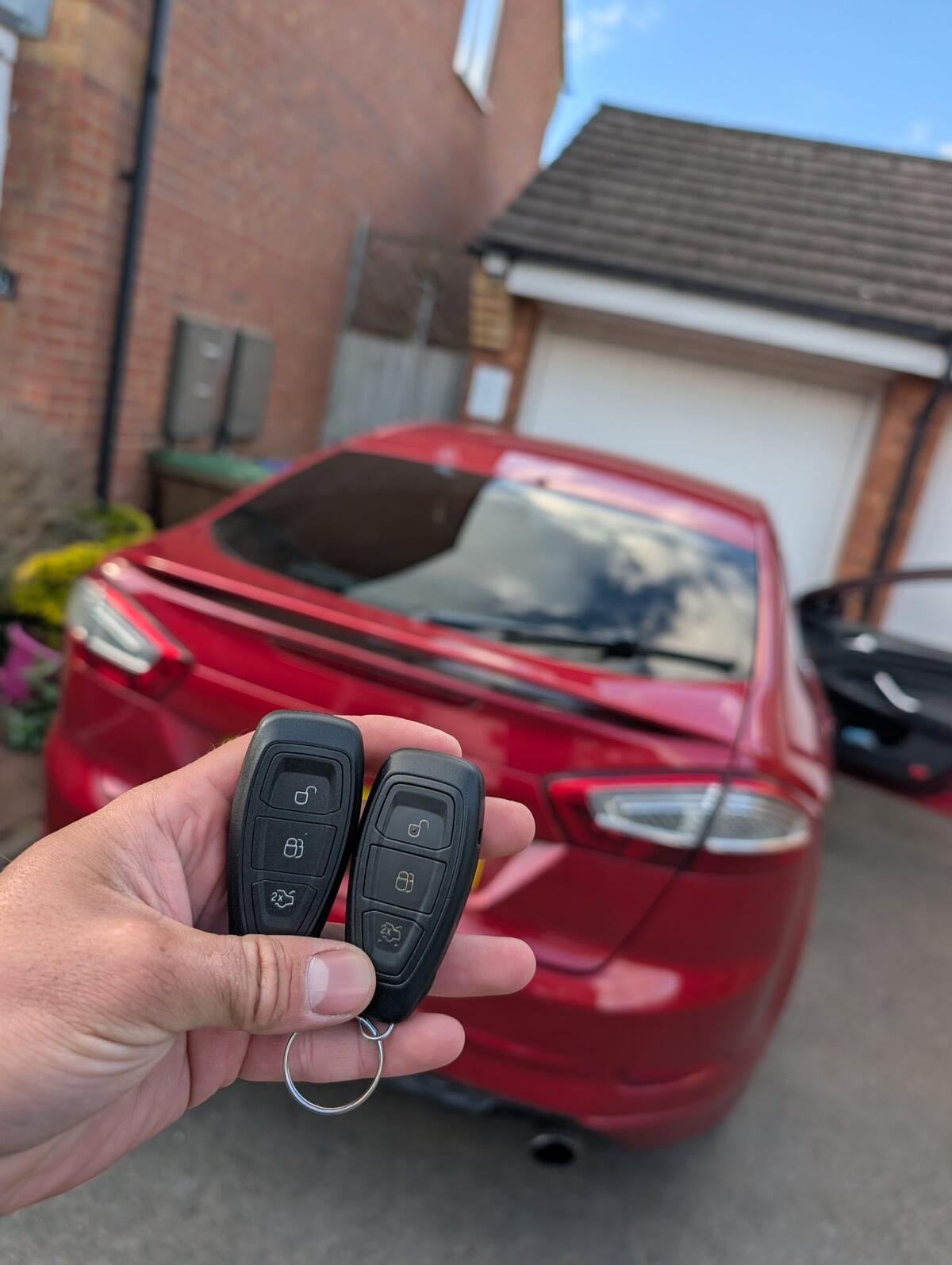 Ford key fobs - original and new spare side by side