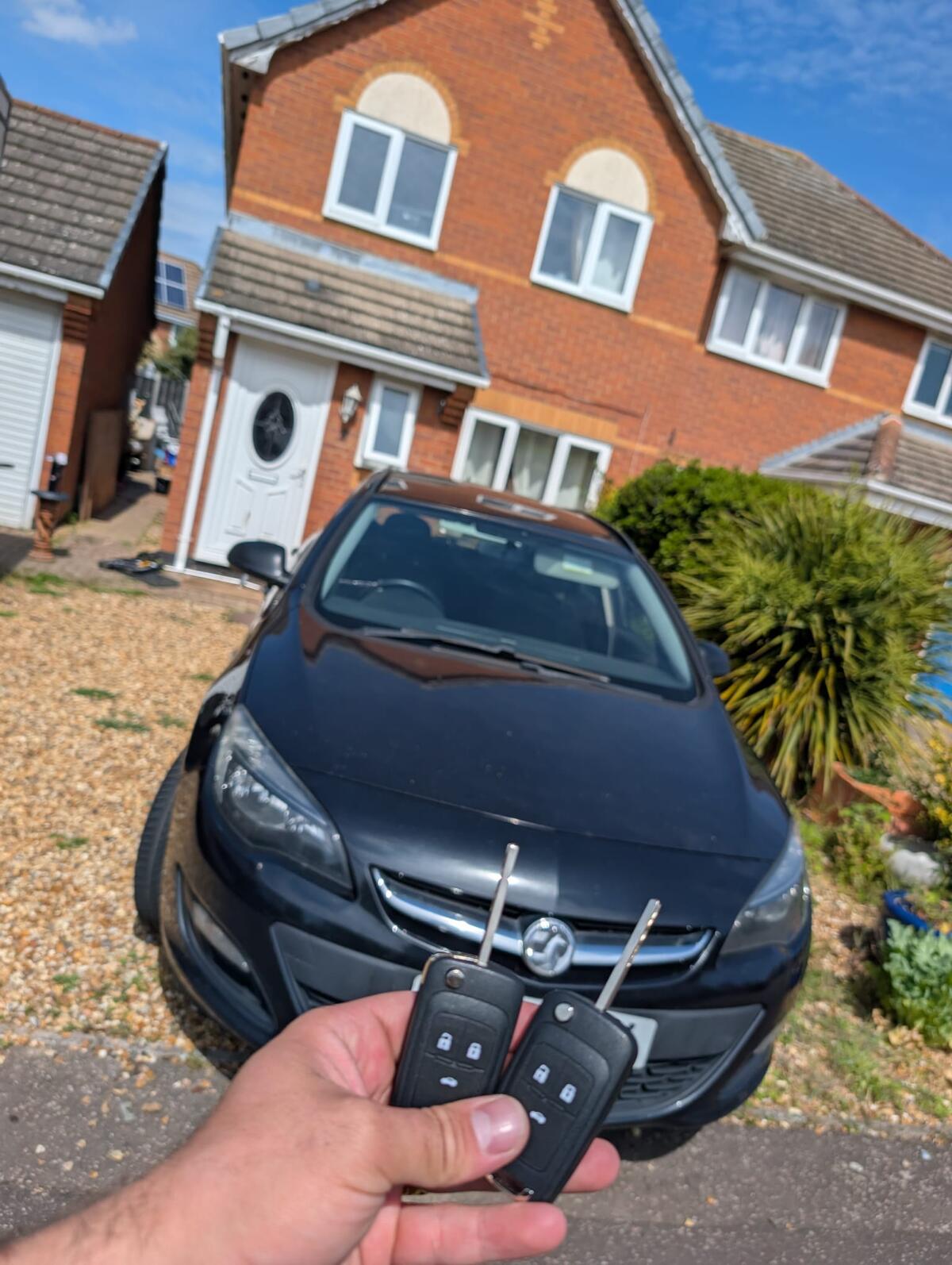 Professional auto locksmith equipment at work