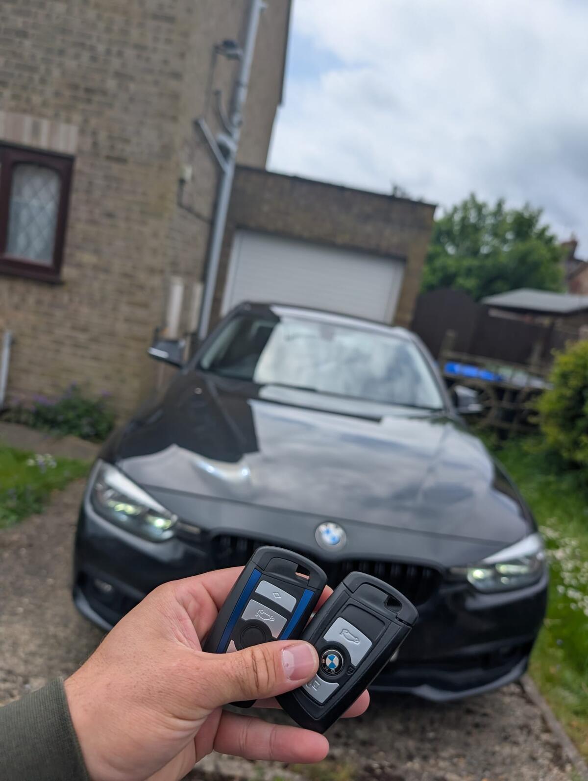 Mobile locksmith completing a key fob job