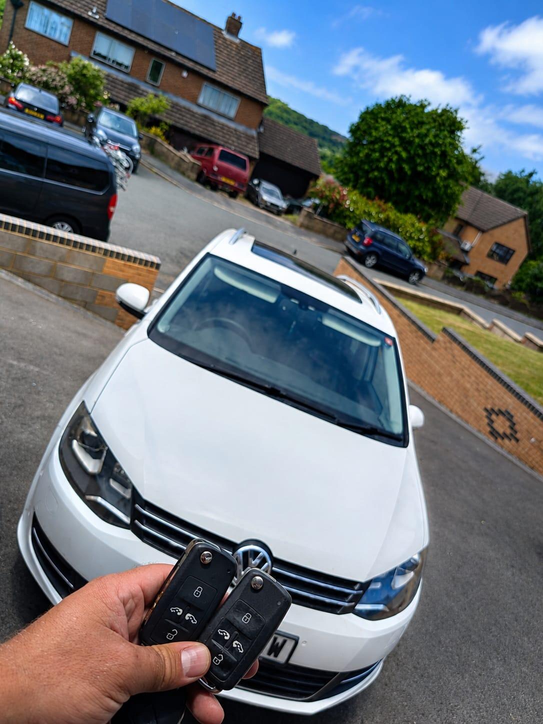 New car key fob handed over to customer